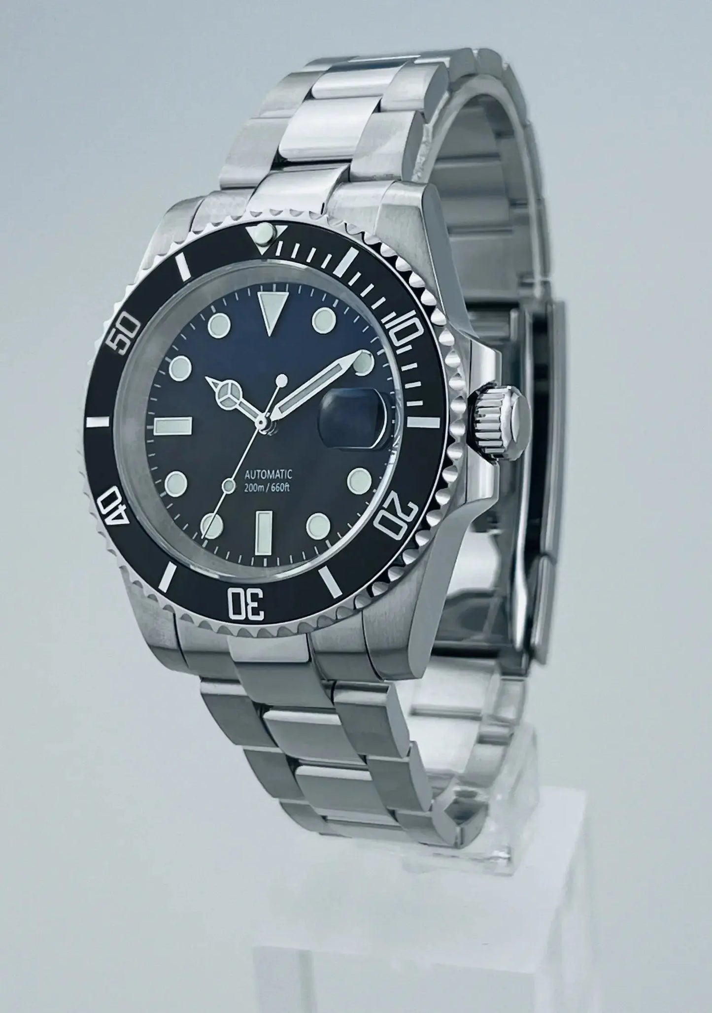 classic submariner watch for man with blue fading into black dial
